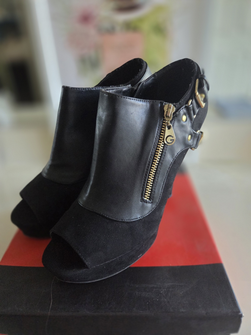 G by GUESS Black Peep-Toe Wedge Booties with Gold Zip Accent